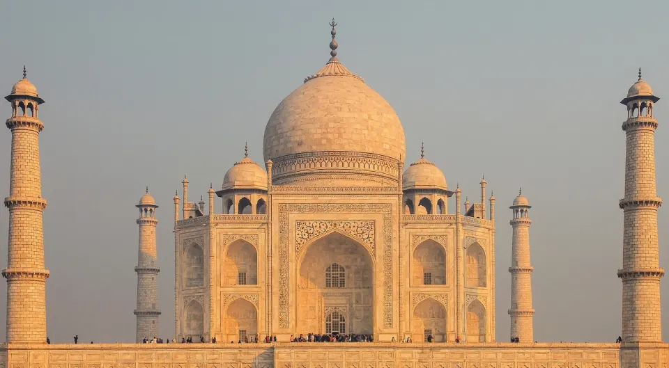 Taj Mahal seen from the main garden path under a clear sky