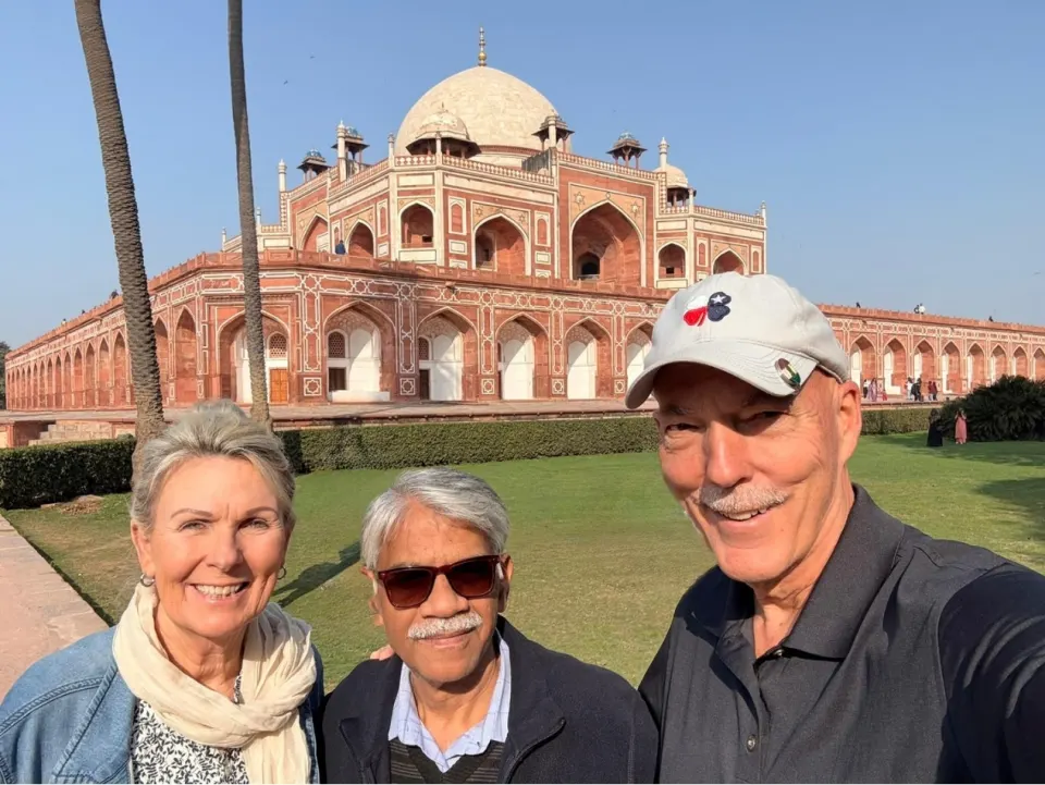 Visitors walking through Humayun’s Tomb garden