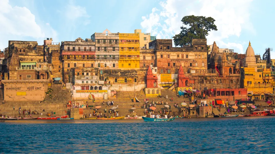 Panoramic view of Varanasi ghats with boats along the River Ganga