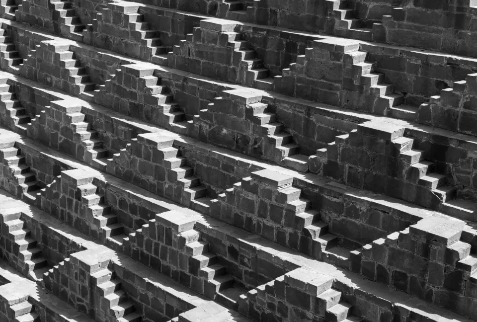 Geometric stepped terraces of Chand Baori stepwell in Abhaneri