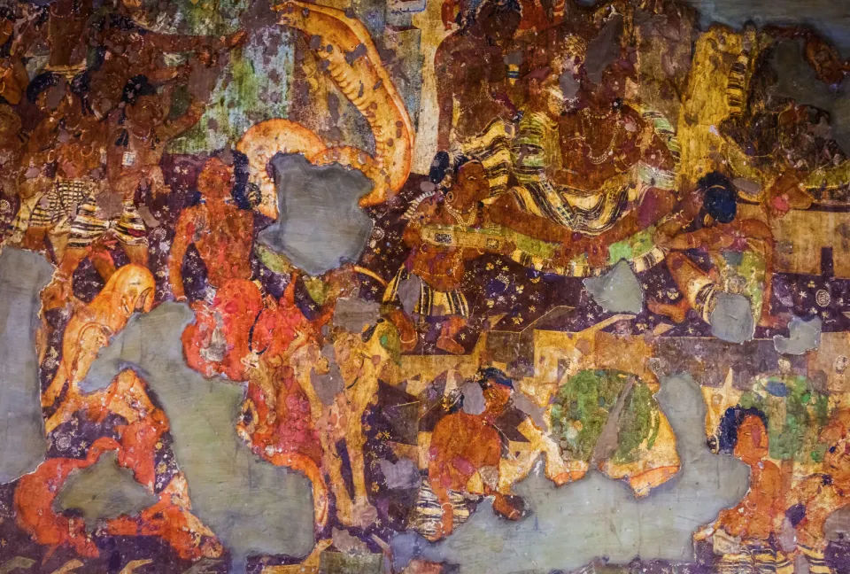 ancient buddhist fresco painting with faded pigments