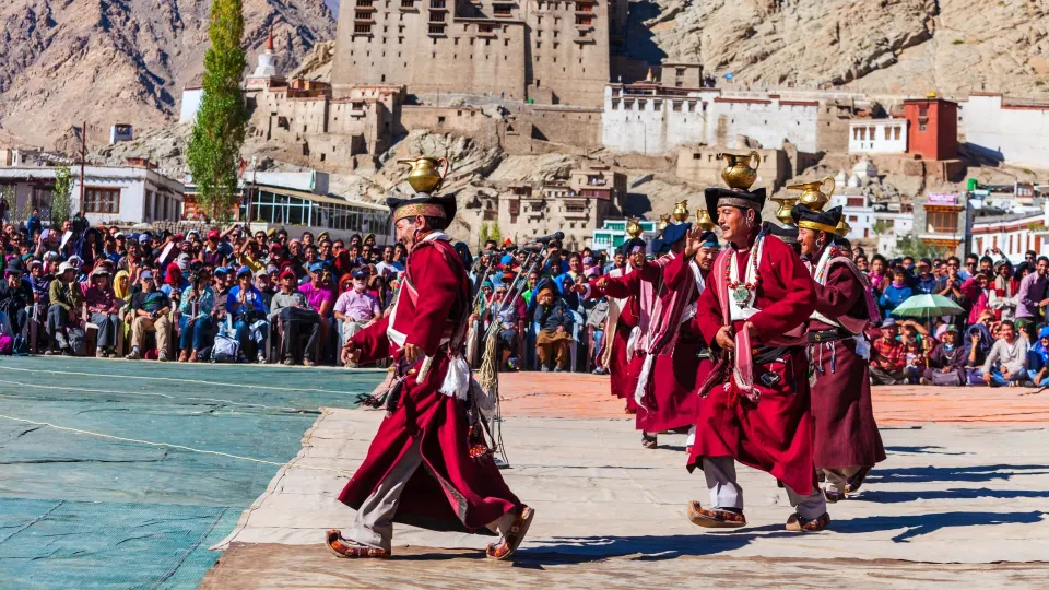 Ladakhi monks performing a traditional masked dance during a monastery festival