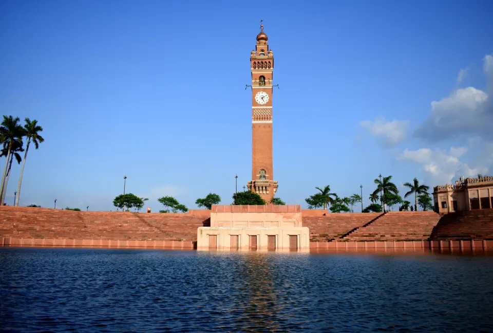 Husainabad Clock Tower overlooking a waterbody in Lucknow