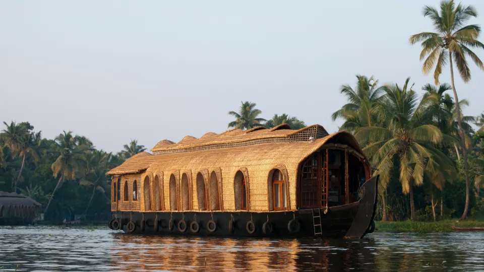 traditional kettuvallam houseboat cruising the alappuzha backwaters