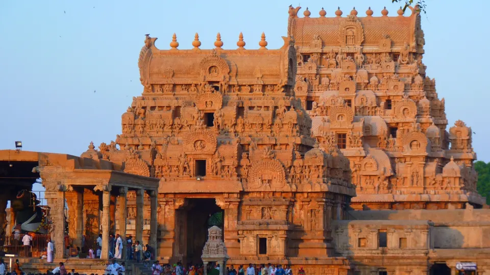 Front gopuram of Brihadeeswarar Temple illuminated by warm evening light