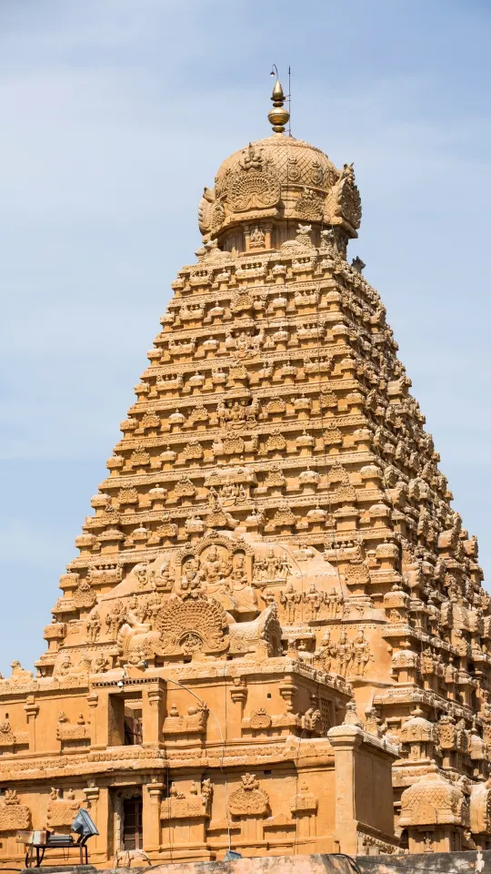 Tall vimana tower of Brihadeeswarar Temple with layered carvings and ornate details