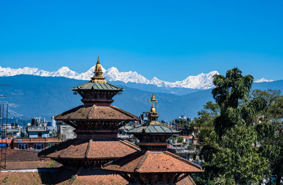 View of Kathmandu rooftops with the Himalayas in the distance
