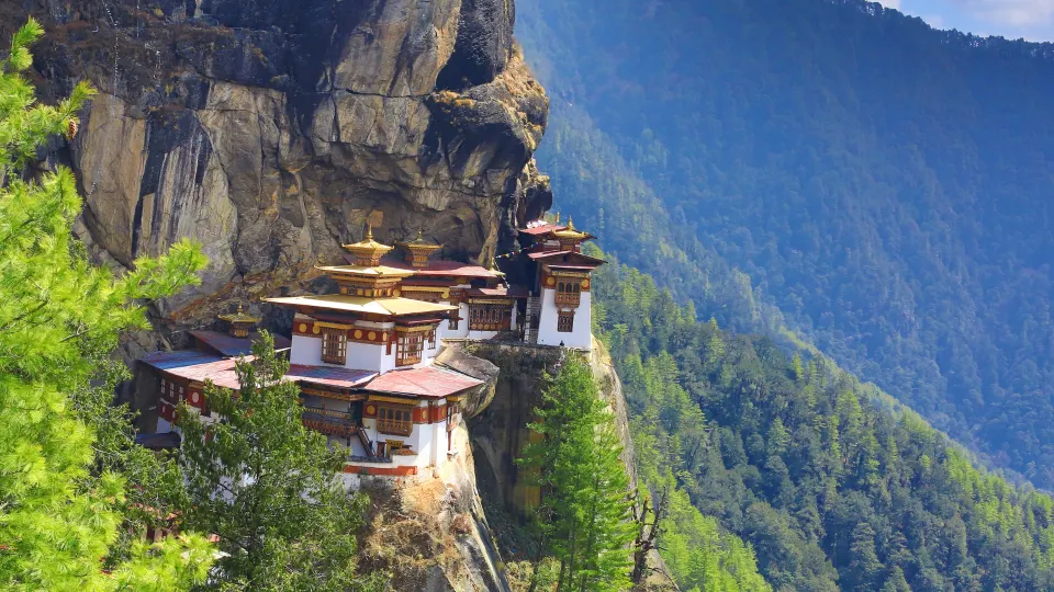 Tiger’s Nest Monastery perched dramatically on a cliffside surrounded by forest