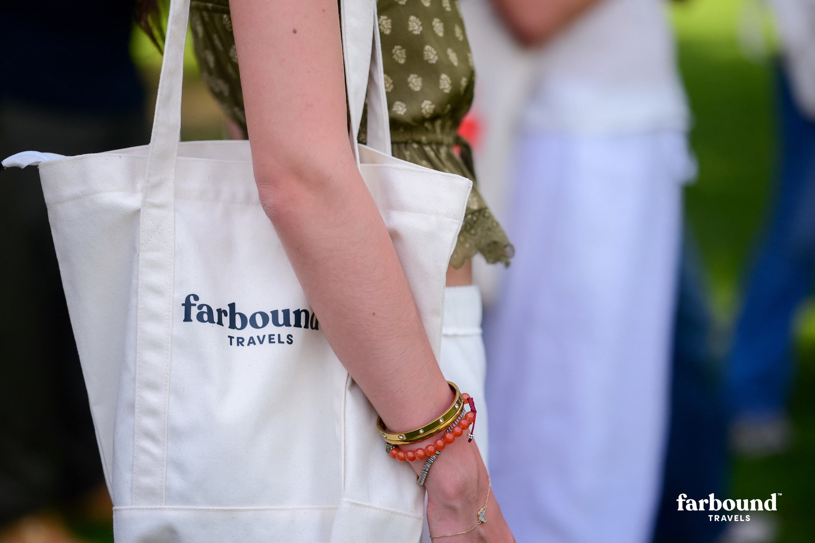 Traveller carrying a Farbound Travels canvas tote bag during a private journey through India.